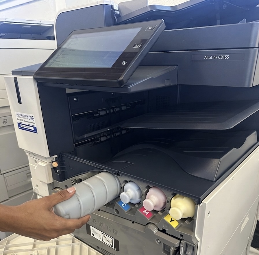 Technician replacing toner in a Xerox AltaLink C8155 at Automation One